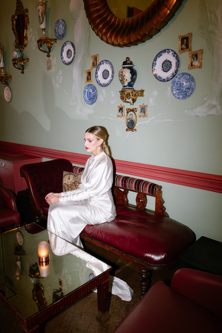 NATHALIE DELENTE PHOTOGRAPHY-128 pair of Jimmy Choo bridal shoes photogaphed in editorial way, positioned on mantal piece next to ornaments